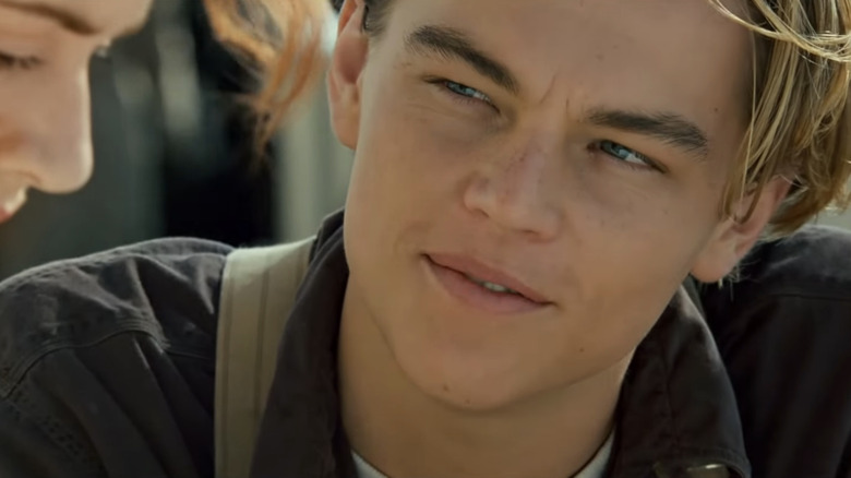Leonardo DiCaprio's Jack Dawson looks over at Kate Winslet's Rose DeWitt Bukater in Titanic