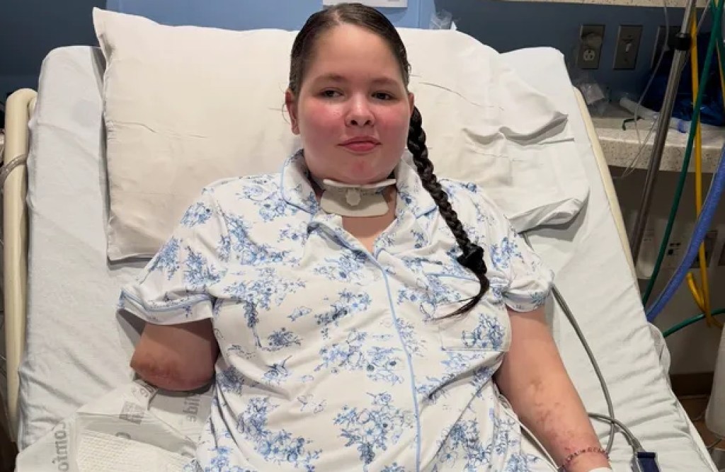 Thirteen-year-old Kaydin Ruiz in a hospital bed after becoming a triple amputee due to severe illness.