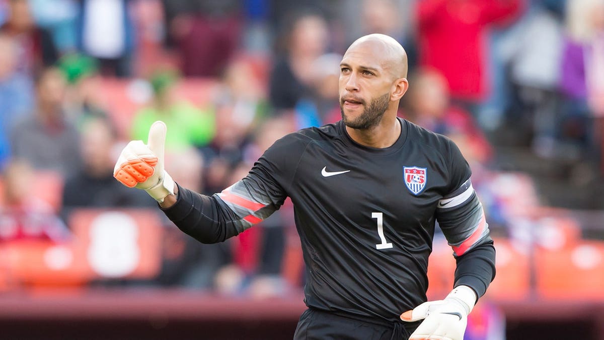 Tim Howard wearing United States soccer uniform playing in a game at Candlestick Park