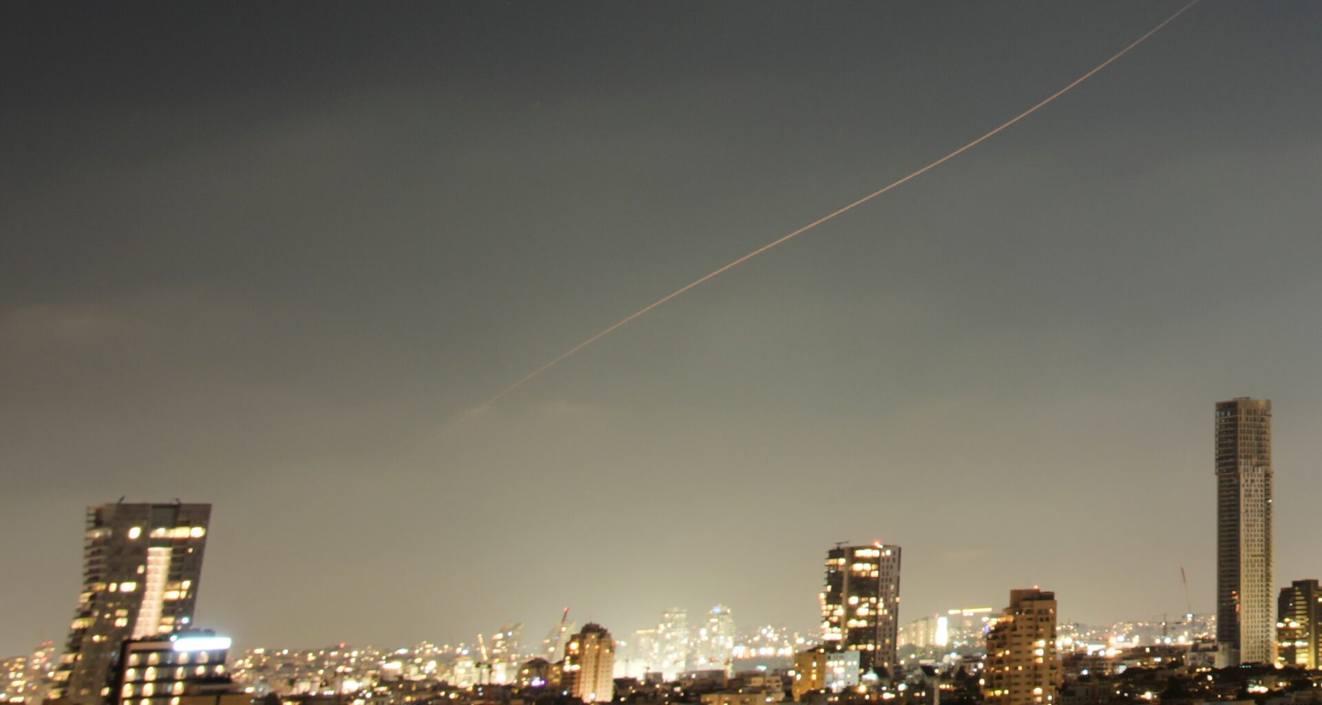 Israel and Iran trade strikes, threatening to drag region back to war