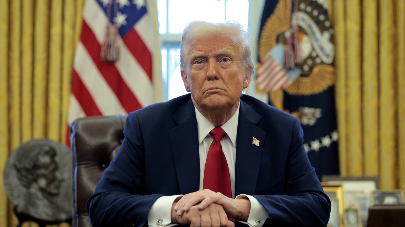 Trump strips job protections from 8,000 federal workers : NPR