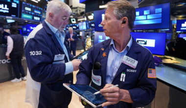 Wall Street inches to more records thanks to booming AI stocks