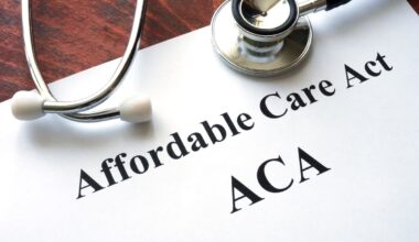 A stethoscope on top of a sheet of paper printed with the words Affordable Care Act and ACA.
