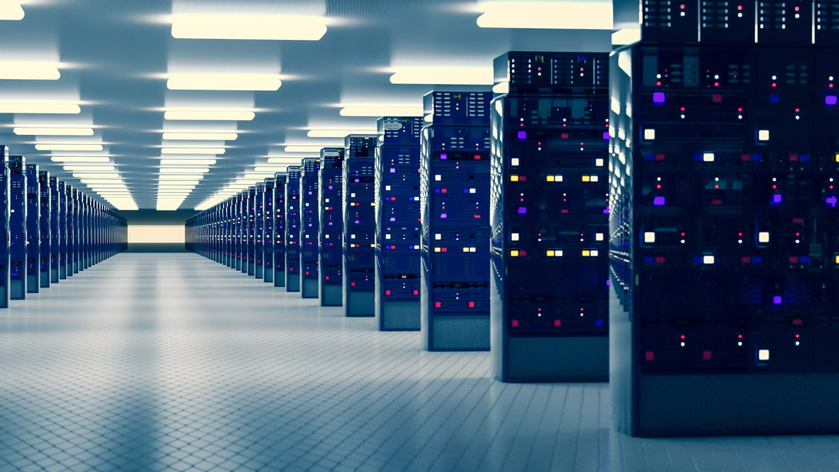 Rows of computer servers in a large data center.