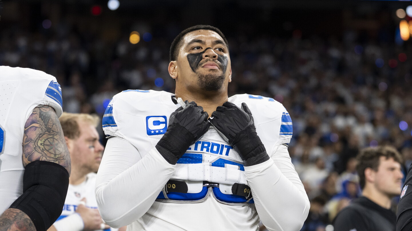 Dan Campbell: Penei Sewell's move to left tackle will be "seamless"