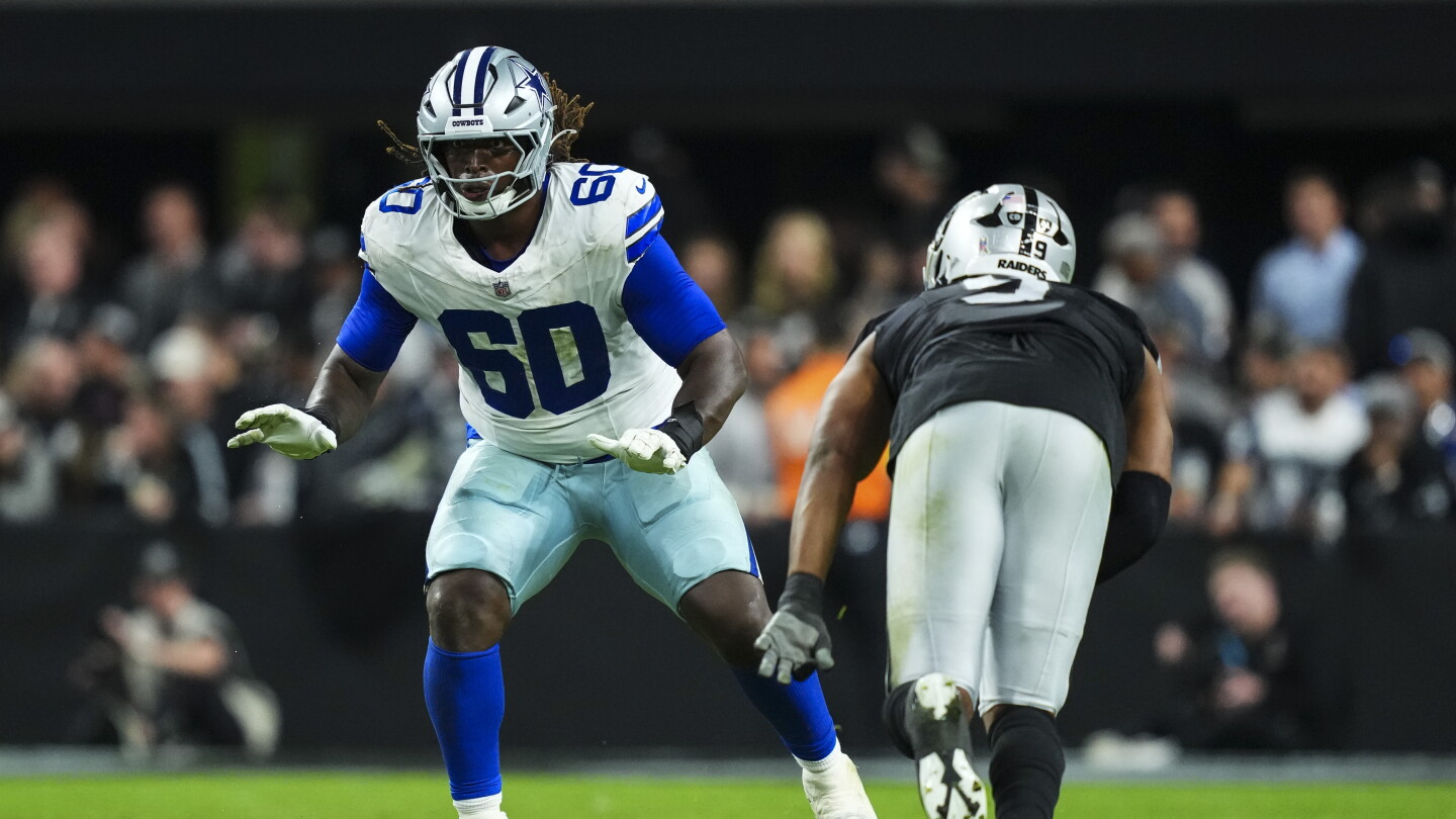 Tyler Guyton in competition with Nate Thomas for starting LT job