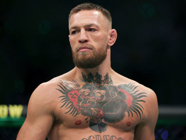 LAS VEGAS, NEVADA - JULY 10: Conor McGregor of Ireland walks in the octagon before his lightweight bought against :Dustin Poirier during UFC 264: Poirier v McGregor 3 at T-Mobile Arena on July 10, 2021 in Las Vegas, Nevada.
