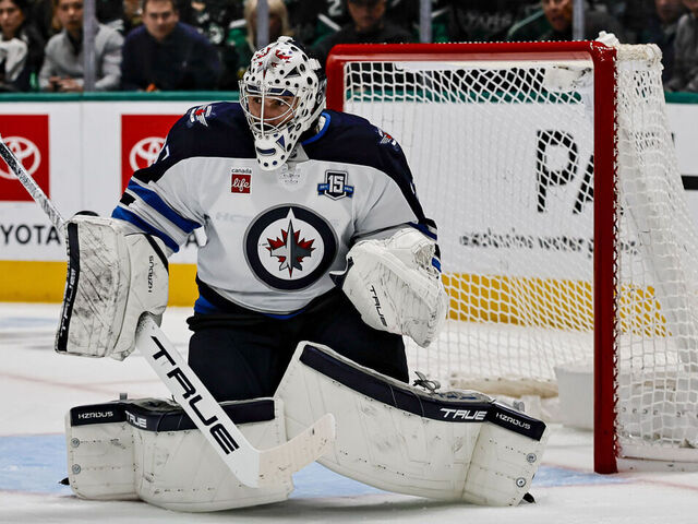 DALLAS, TX - APRIL 02: Winnipeg Jets goaltender Connor Hellebuyck (37) waits for the action to come to him during the game between the Dallas Stars and the Winnipeg Jets on April 2, 2026 at American Airlines Center in Dallas, TX.