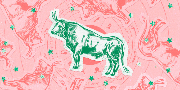 Paper cutouts of the Taurus zodiac on a red background