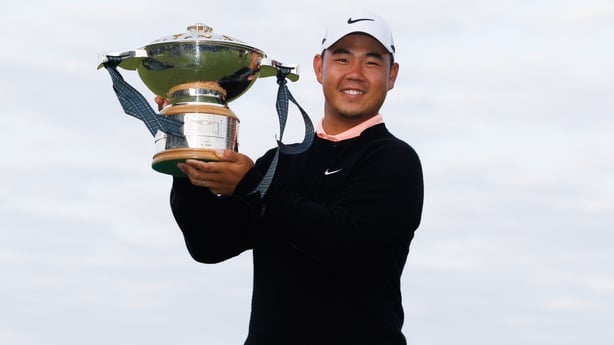 NORTH BERWICK, SCOTLAND - JULY 12: Tom Kim of South Korea with The Scottish Open Quaich after winning the Scottish Open during day four of the 2026 Genesis Scottish Open at the Renaissance Club, on July 12, 2026, in North Berwick, Scotland. (Photo by Ross Parker/SNS Group via Getty Images)