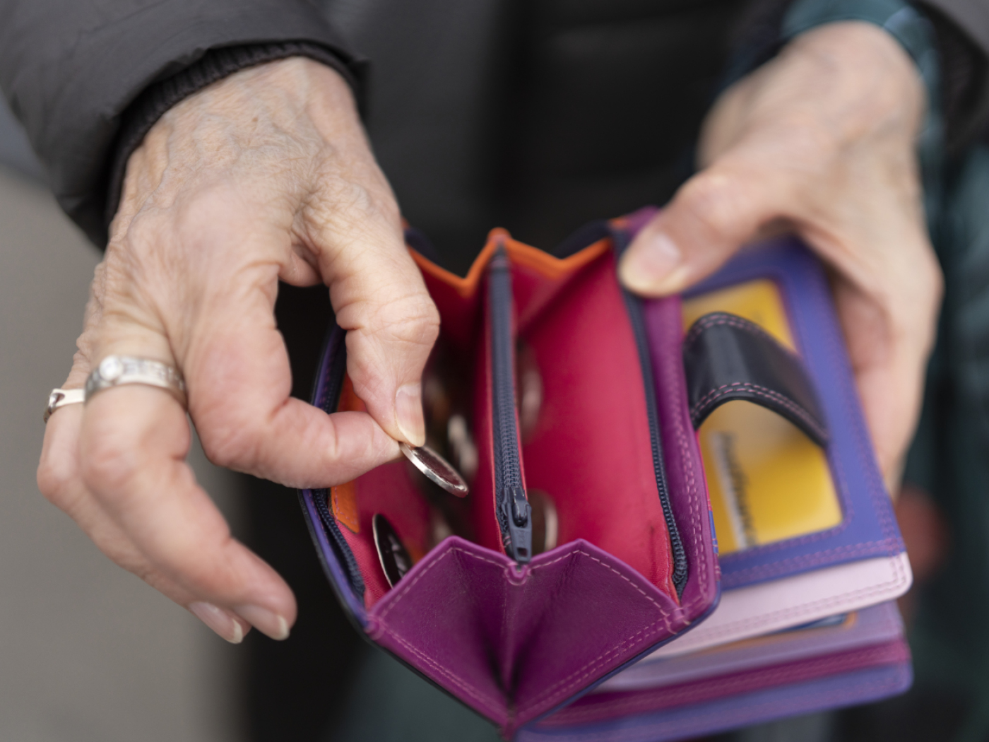Open purse and coins