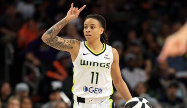 Jun 11, 2025; Phoenix, Arizona, USA; Dallas Wings guard JJ Quinerly (11) against the Phoenix Mercury at PHX Arena. Mandatory Credit: Mark J. Rebilas-Imagn Images