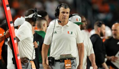 Nov 15, 2025; Miami Gardens, Florida, USA; Miami Hurricanes head coach Mario Cristobal watches from the sideline against NC State Wolfpack during the fourth quarter at Hard Rock Stadium. Mandatory Credit: Sam Navarro-Imagn Images