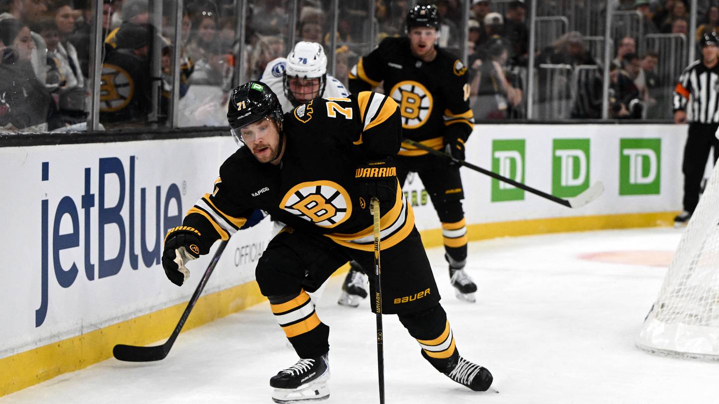 Apr 11, 2026; Boston, Massachusetts, USA; Boston Bruins left wing Viktor Arvidsson (71) skates for the puck against the Tampa Bay Lightning during the first period at the TD Garden. Mandatory Credit: Brian Fluharty-Imagn Images