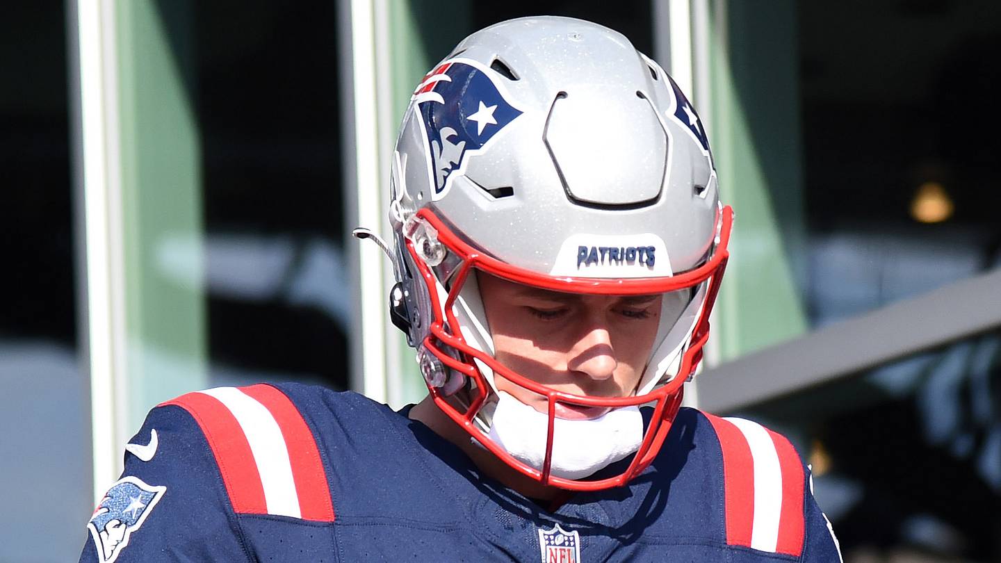 Nov 5, 2023; Foxborough, Massachusetts, USA; New England Patriots quarterback Mac Jones (10) walks to the field for pregame warmups prior to a game against the Washington Commanders at Gillette Stadium. Mandatory Credit: Bob DeChiara-USA TODAY Sports