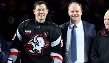 Former Buffalo Sabres general manager Kevyn Adams alongside Jeff Skinner