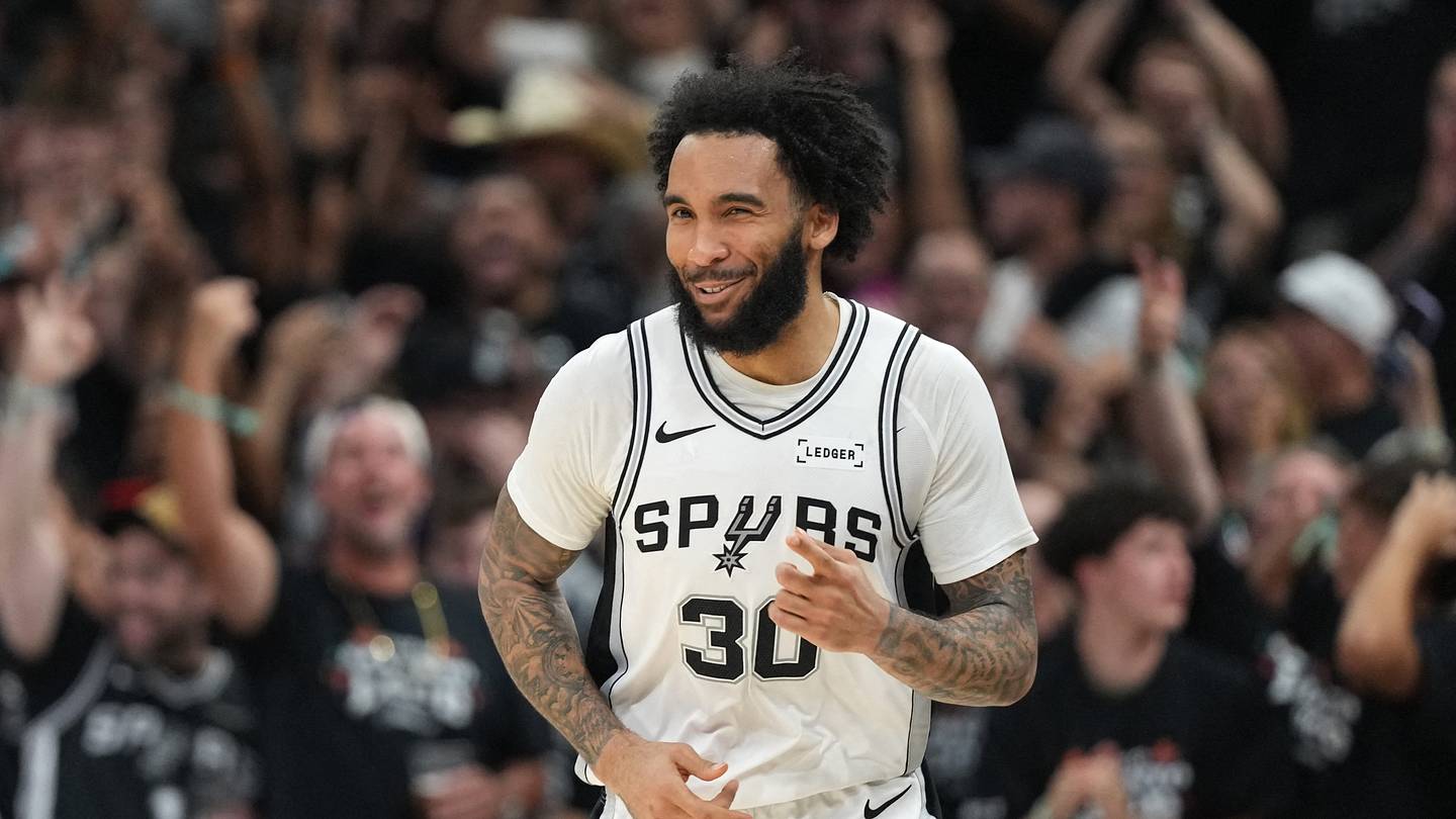 Apr 28, 2026; San Antonio, Texas, USA; San Antonio Spurs forward Julian Champagnie (30) reacts after scoring a three point basket during the second half of game five of the first round of the 2026 NBA Playoffs against the Portland Trail Blazers at Frost Bank Center. Mandatory Credit: Scott Wachter-Imagn Images