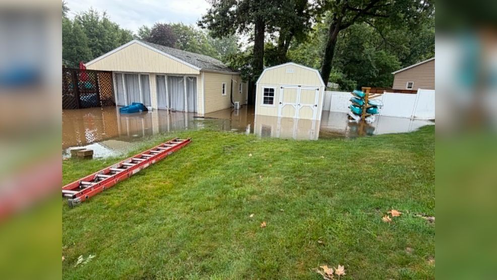 A flooded yard in Quincy Township. Residents say they haven't seen this amount of rain in decades. (Holly Diamond/WWMT)