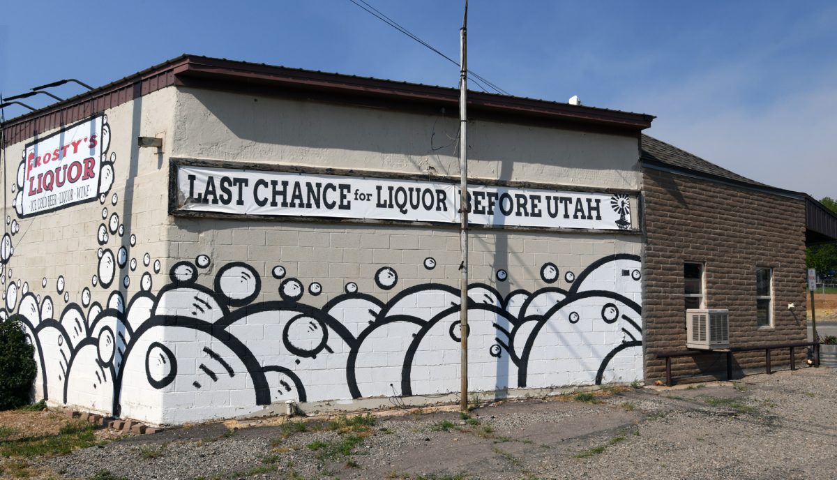 Frosty's Liquor in Dove Creek is decorated with a mural warning travelers: Last Chance for Liquor Before Utah
