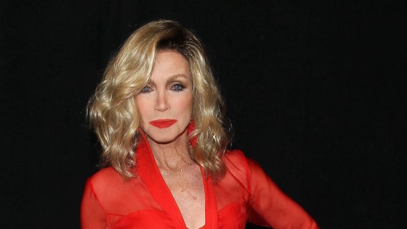 NEW YORK, NY - FEBRUARY 12: Actress Donna Mills prepares backstage at the Go Red For Women Red Dress Collection 2015 presented by Macy's fashion show during Mercedes-Benz Fashion Week Fall 2015 at The Theatre at Lincoln Center on February 12, 2015 in New York City. (Photo by Astrid Stawiarz/Getty Images for Go Red)
