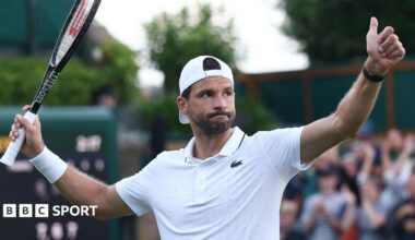 Grigor Dimitrov gives a thumb up to the crowd after winning his first-round match