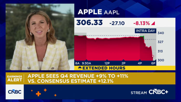 Apple shares sliding on revenue guidance