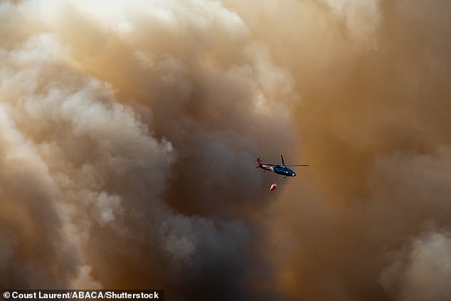 Helicopters have been deployed in an attempt to stem the fires by dropping water from above