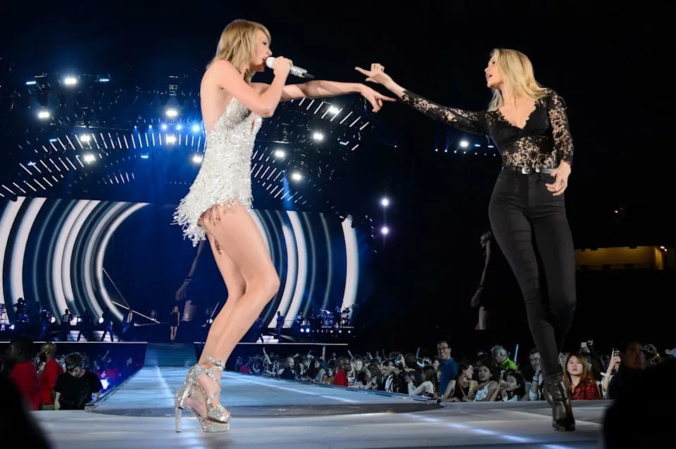 Taylor Swift and Gigi Hadid on stage during the 1989 World Tour show in Detroit, Michigan, on May 30, 2015.Credit: Getty Images