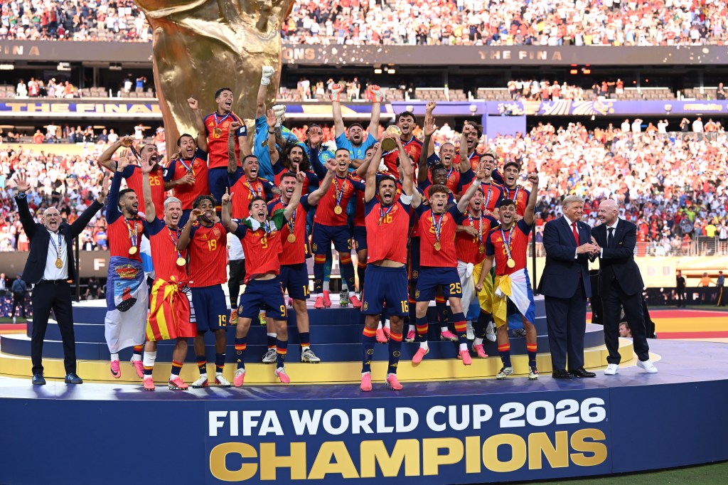 Spain's team, President Donald Trump, and FIFA President Gianni Infantino celebrating their victory at the FIFA World Cup 2026.