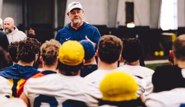 Mike Jacobs speaking to his team at a Toledo practice