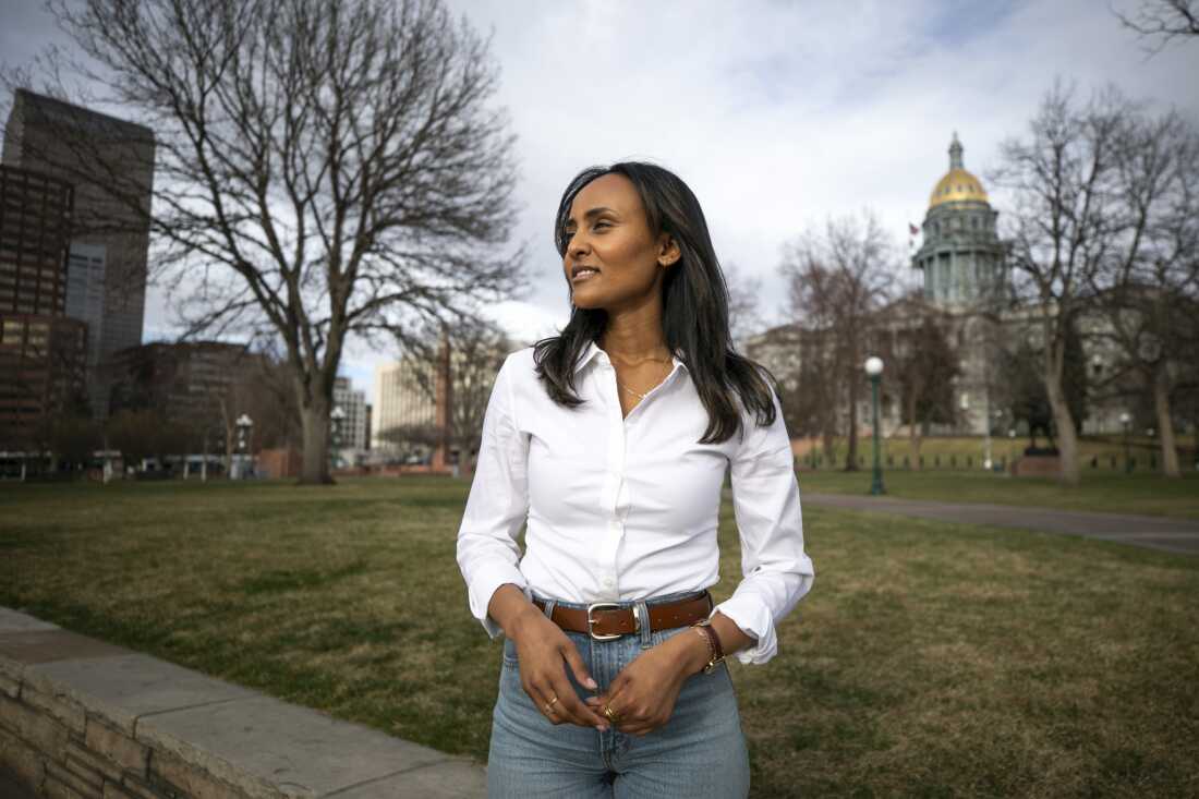 Melat Kiros, a political newcomer and democratic socialist, has won the Democratic primary for the U.S. House in her Denver-area district, according to an AP race call. Above, Kiros stands near the Colorado State Capitol on March 17, 2026.