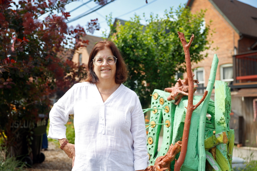Yetta Starr stands next to one of Milton Mizenburg Jr.’s sculptures at Oakland Museum and Garden on Saturday, June 27, 2026, in Oakland. Starr helped get the street named after Mizenburg and worked with an artist to revitalize the sculptures.