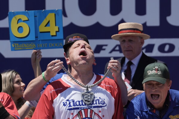 Joey Chestnut wins the 2026 Nathan's Famous Fourth of July hot dog eating contest at Coney Island in the Brooklyn borough of New York, Saturday, July 4, 2026. (AP Photo/Anna Connors)