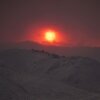 The sun sets over the Cottonwood Fire near Marysvale, Utah, on Friday, June 26, 2026.
