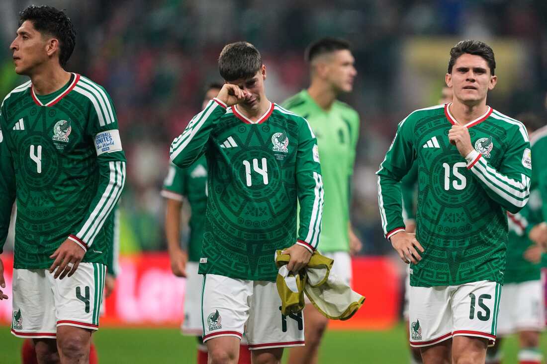 Mexico players react following the World Cup round of 16 soccer match between Mexico and England in Mexico City, Sunday, July 5, 2026.