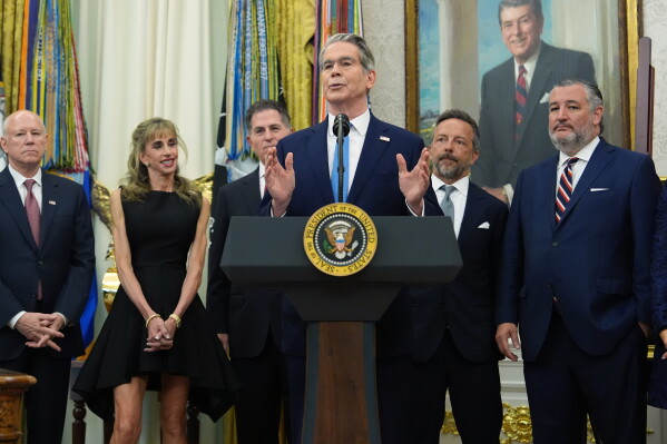Treasury Secretary Scott Bessent speaks before President Donald Trump rings the opening bell for the New York Stock Exchange and the Nasdaq in the Oval Office at the White House, Monday, July 6, 2026, in Washington. (AP Photo/Mark Schiefelbein)