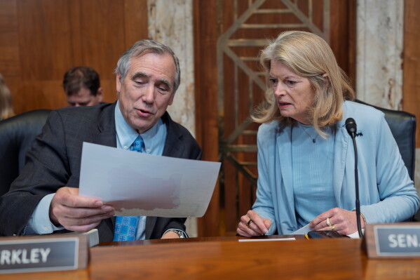 Sen. Jeff Merkley, D-Ore., the ranking member, and Sen. Lisa Murkowski, R-Alaska, chair of the Senate Appropriations Subcommittee on Interior, Environment, and Related Agencies, prepare to hear from U.S. Forest Service Chief Tom Schultz on his 2027 budget request, at the Capitol in Washington, Thursday, April 30, 2026. (AP Photo/J. Scott Applewhite)