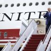 U.S. President Donald Trump pumps his fist after touring the inside of the newest aircraft in the presidential fleet at Andrews Air Force Base on June 19, 2026 at Joint Base Andrews, Maryland.