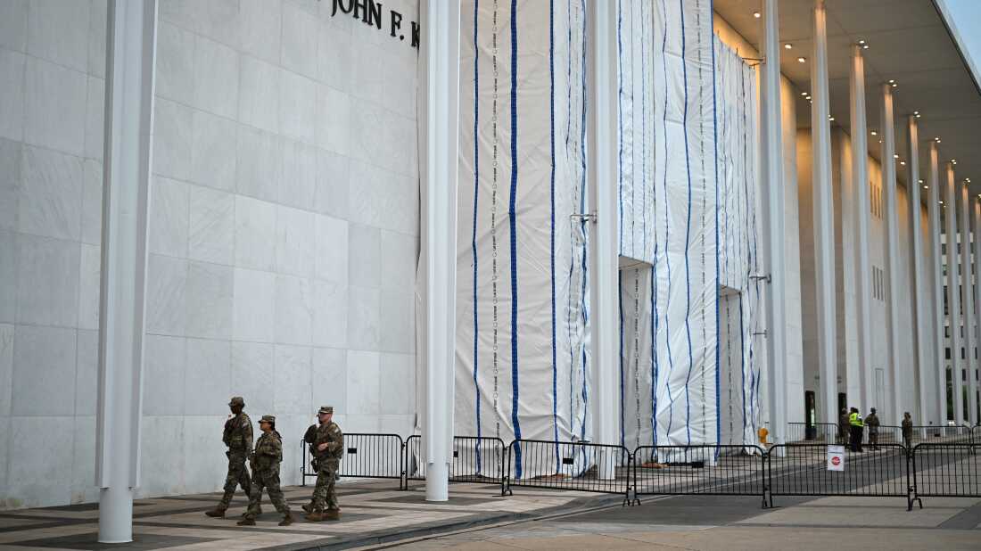 The Kennedy Center on June 28, with its facade signage still covered by a tarp and scaffolding.