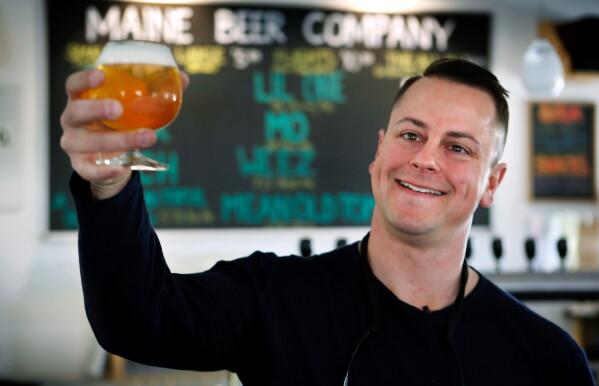Dan Kleban, a co-owner of the Maine Beer Company, poses in the company's tasting room in Freeport, Maine, May 7, 2015. (AP Photo/Robert F. Bukaty, File)