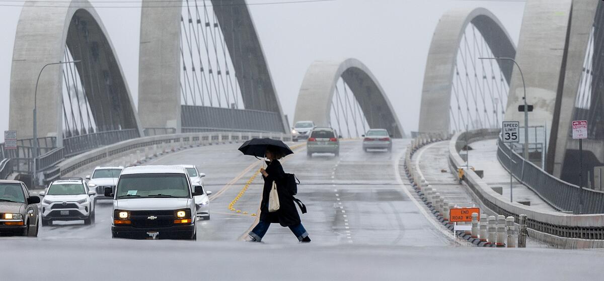 Rain falls across a bridge in Los Angeles