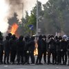 Youths gather in front of a burning barricade on Duncairn Gardens on June 9 in Belfast, Northern Ireland.