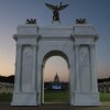 A scaled-down replica of Trump's proposed arch frames the U.S. Capitol at the Great American State Fair.