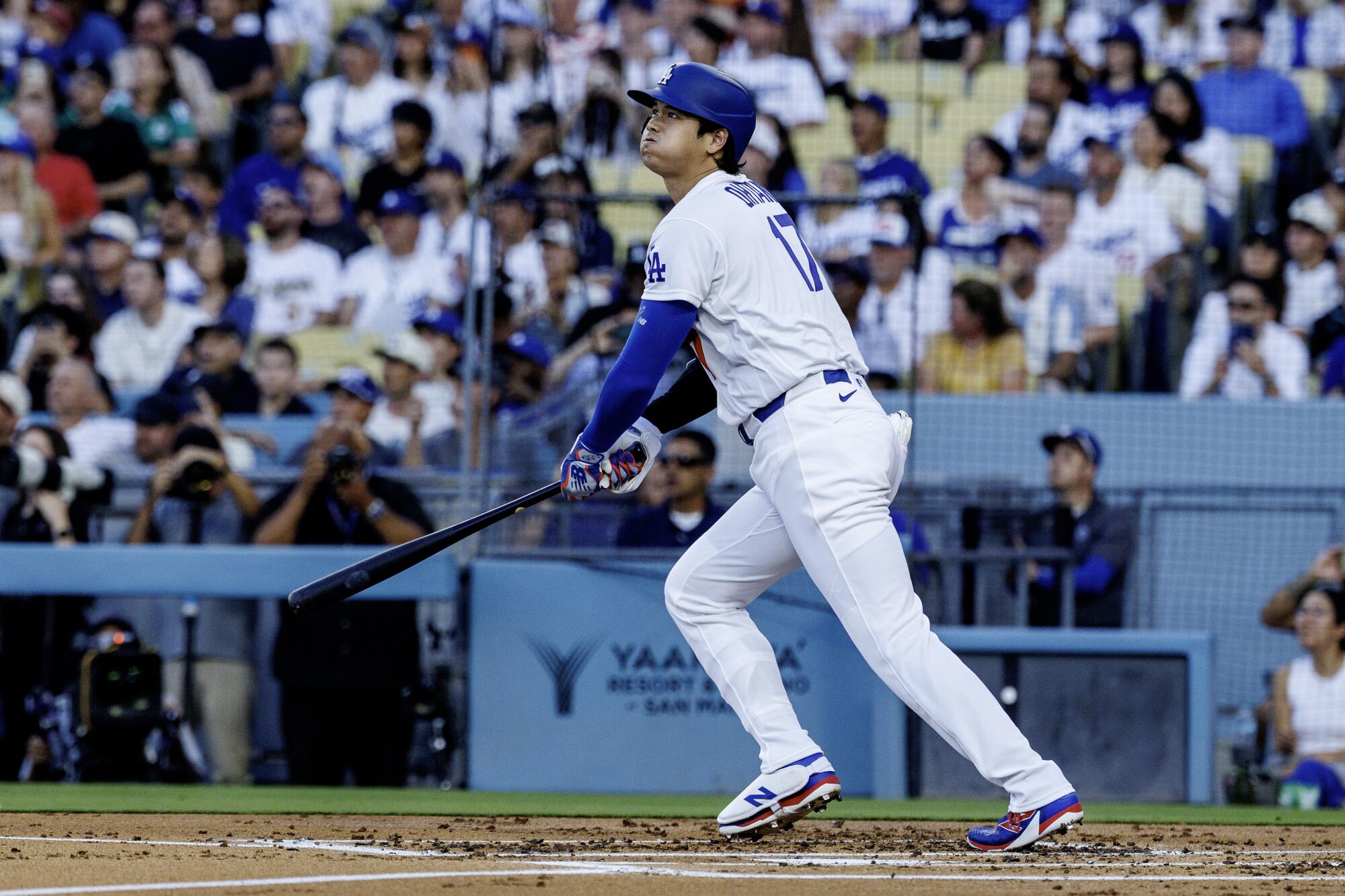 Dodgers star Shohei Ohtani hits a leadoff home run during a 9-3 loss to the Arizona Diamondbacks.