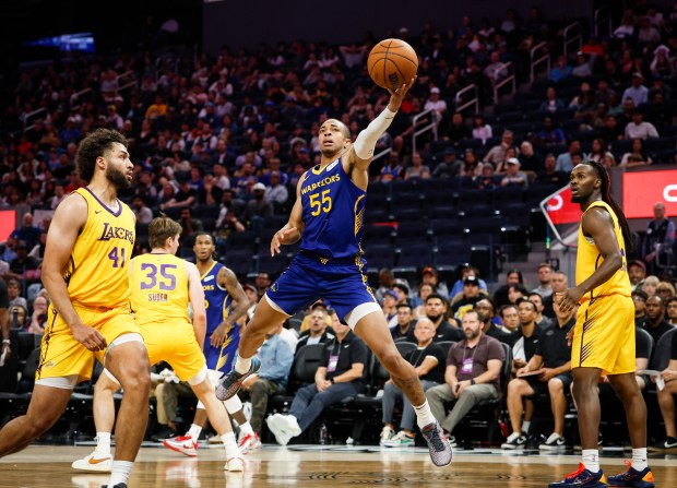 Golden State Warriors' Chance McMillian (55) takes a shot against Los Angeles Lakers' Anton Watson (41) and Los Angeles Lakers' Peter Suder (35) in the fourth quarter during a Summer League game at Chase Center in San Francisco, Calif., on Friday, July 3, 2026. (Shae Hammond/Bay Area News Group)