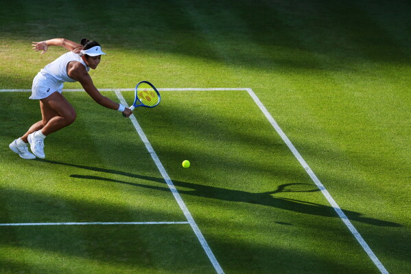 Lanlana Tararudee of Thailand runs for the ball during the second round women's singles match against Ekaterina Alexandrova of Russia at the Wimbledon Tennis Championships in London, Wednesday, July 1, 2026.(AP Photo/Maja Smiejkowska)