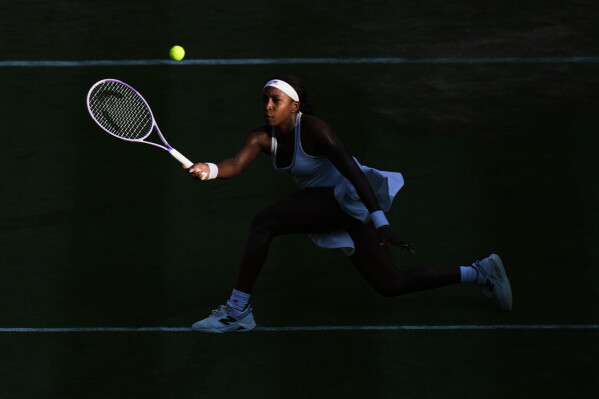 Coco Gauff of the United States plays a return during the third round women's singles match against Claire Liu of the United States at the Wimbledon Tennis Championships in London, Friday, July 3, 2026.(AP Photo/Brian Inganga)
