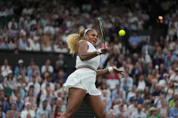 Serena Williams of the United States plays a forehand against Maya Joint of Australia in their first round women's singles match at the Wimbledon Tennis Championships in London, Tuesday, June 30, 2026. (AP Photo/Maja Smiejkowska)