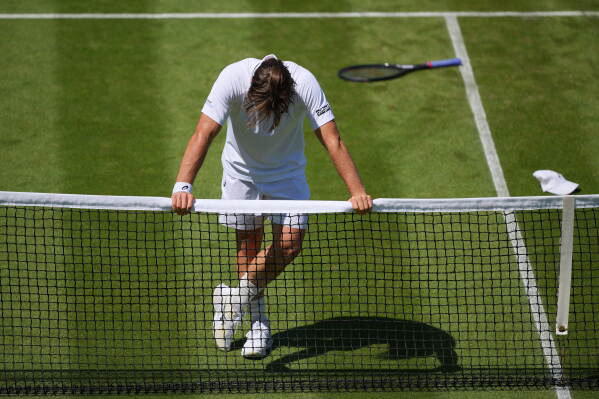 Arthur Fery of Britain reacts after winning the second round men's singles match against Otto Virtanen of Finland at the Wimbledon Tennis Championships in London, Thursday, July 2, 2026.(AP Photo/Kin Cheung)