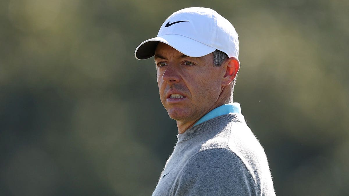 Rory McIlroy looks across the ninth green during a practice round.